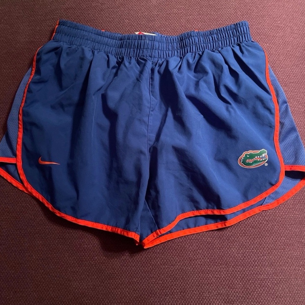 Nike Women's Royal Blue Athletic Shorts with Orange Trim